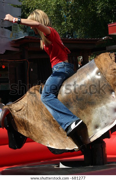 young female mechanical\
bull rider 2