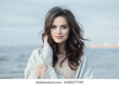 Young female model with makeup, clean skin, healthy hairstyle and friendly smile on sea beach. Natural beauty woman portrait - Powered by Shutterstock