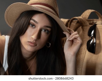 Young female model posing in a studio for fashion and beauty