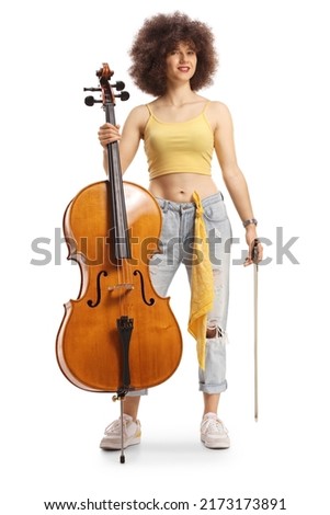Young female musician with a cello and a fiddlestick isolated on white background