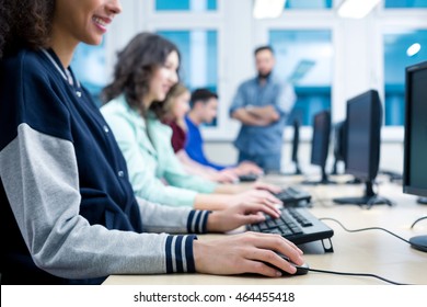 Young Female Participant Of Computer Course Is Working On A Keyboard