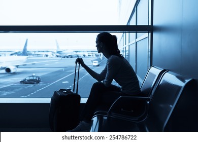 Young female passenger at the airport 