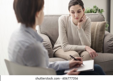 Young Female Patient Talking With Her Therapist In The Office, Mental Health And Psychotherapy Concept