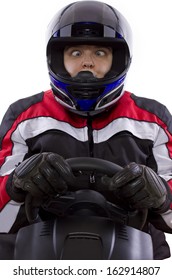 Young Female Race Car Driver In A Racing Suit And Helmet