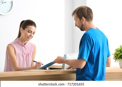 Young Female Receptionist Meeting Client Office Stock Photo 717201655 ...