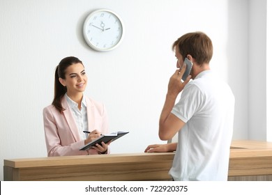 Young Female Receptionist Meeting Client Office Stock Photo 722920375 