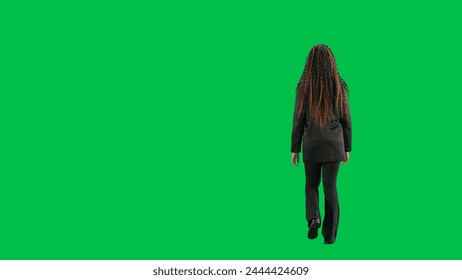 Young female reporter isolated on chroma key green screen background. Full shot african american woman tv news host walking. Back view. - Powered by Shutterstock