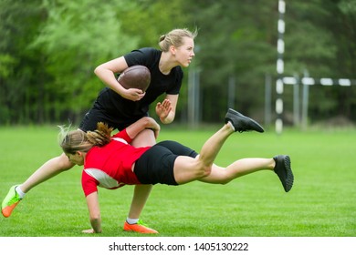 The young female rugby player on green backround - Powered by Shutterstock