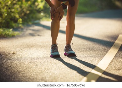 Young Female Runner Got Sports Injury On Knee 