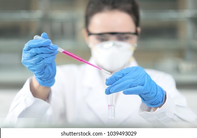 Young Female Scientist Working In The CDC Laboratory