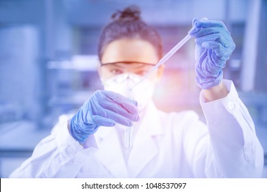 Young Female Scientist Working In The CDC Laboratory