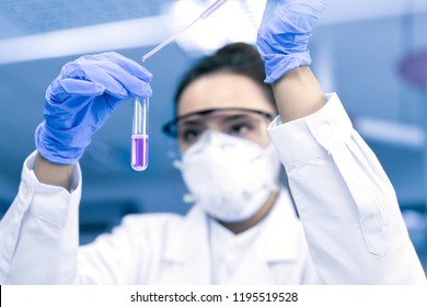 Young Female Scientist Working In The CDC Laboratory