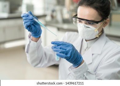 Young Female Scientist Working In The CDC Laboratory