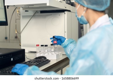 Young Female Scientist Working In The CDC Laboratory.