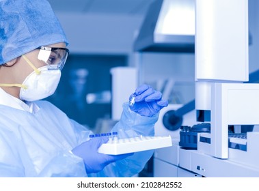 Young Female Scientist Working In The CDC Laboratory.