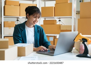 Young Female Small Business Entrepreneur, Online Business Startup Owner Woking On Laptop At Home Happy And Excited About Online Order Form Customers. Online Merketing, E-commerce Comept.