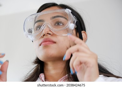 A Young Female South Asian Doctor From India In Glasses