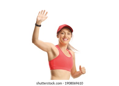 Young female in sportswear waving a the camera isolated on white background