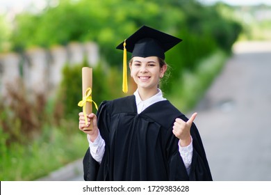 Young Female Student Diploma Poses Outdoors Stock Photo (Edit Now)  1729383628