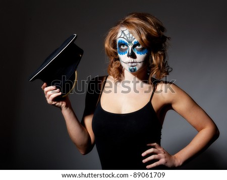 Young female with sugar skull make up