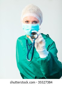 Young Female Surgeon Holding Stethoscope Outwards