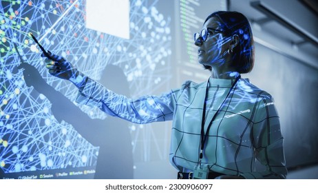 Young Female Teacher Giving a Data Science Presentation in a Dark Auditorium with Projecting Slideshow with Artificial Intelligence Neural Network Architecture. Business Startup and Education Concept