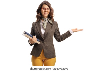 Young female teacher holding something imaginary with one hand isolated on hite background