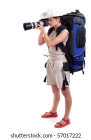 young female tourist with backpack and digital camera