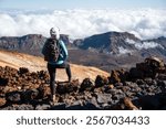 Young Female Tourist Trekking in Teide National Park, Tenerife: Adventure in Nature