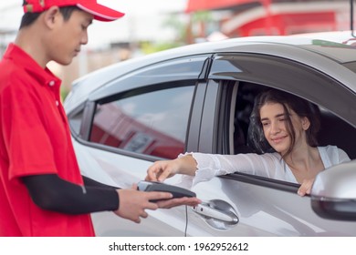 Young Female Tourists Drive To Refuel, Use Credit Card, Swipe Their Card For Gas Station. 