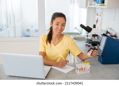 Young Female Veterinarian Working In Clinical Laboratory