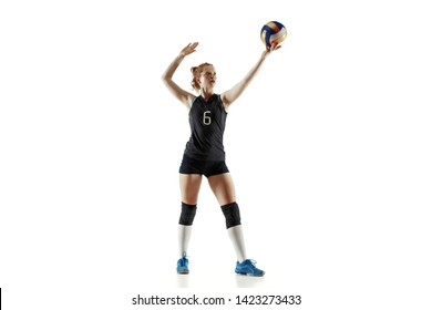 Young female volleyball player isolated on white studio background. Woman in sport's equipment and shoes or sneakers training and practicing. Concept of sport, healthy lifestyle, motion and movement. - Powered by Shutterstock