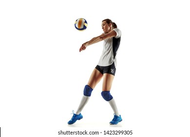 Young female volleyball player isolated on white studio background. Woman in sport's equipment and shoes or sneakers training and practicing. Concept of sport, healthy lifestyle, motion and movement. - Powered by Shutterstock