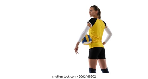 Young Female Volleyball Player Standing Isolated On White Studio Background. Woman In Sport's Shoes Or Sneakers Training And Practicing. Concept Of Sport, Healthy Lifestyle, Motion And Movement.