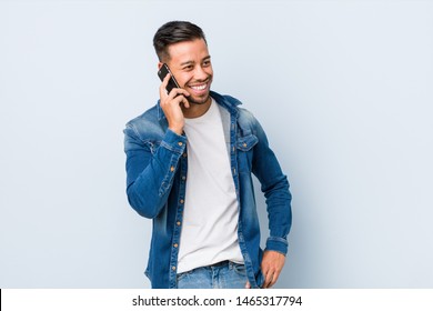 Young Filipino Man Talking On Phone