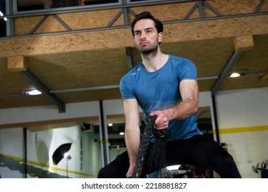 Young Fit Male Working Out In The Gym, Rope Strength Workout