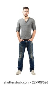 Young Fit Standing Man With Hands In Pocket. Full Body Length Portrait Isolated Over White Background.