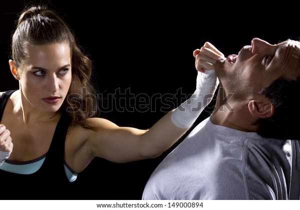 https://image.shutterstock.com/image-photo/young-fit-woman-fighting-man-600w-149000894.jpg