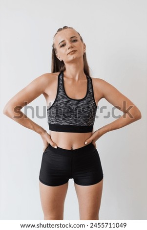 Similar – Slim figure shapely woman in sportswear