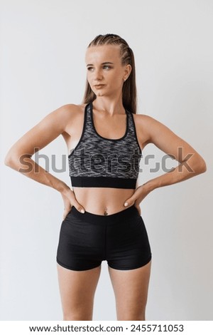 Similar – Slim figure shapely woman in sportswear