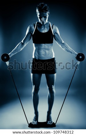 Similar – Rear view portrait of one young athletic woman at crossfit training, exercising with trx suspension fitness straps over dark background