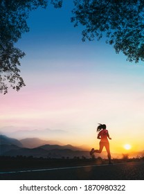 Young Fitness Asian Woman Is Running And Jogging An Outdoor Workout On The Road In The Morning For Lifestyle Health.