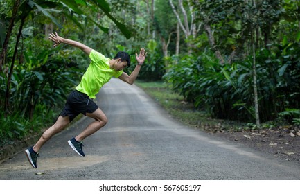 Young fitness man runner running wrong way