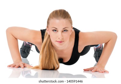 Young Fitness Woman Doing Push Up, Isolated On White Background