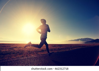  Young Fitness Woman Runner Running On Sunrise Seaside Trail