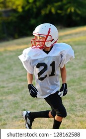 Young Football Player Going Out For A Pass.