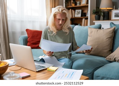 Young freelance business finance woman has a problem with attention deficit hyperactivity disorder ADHD she cant start work on project. Female lost concentration cant work from home on laptop computer - Powered by Shutterstock