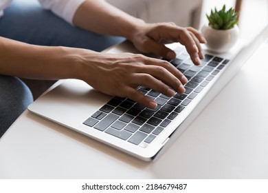 Young Freelancer Woman Working At Computer At Home, Using Laptop, Typing On Keyboard Cropped Shot. Hands And Fingers Close Up. Freelance Writer, Student Writing Article, Essay