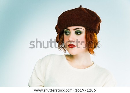 Young French Brunette Girl With Short Haircut In Brown Beret On Light Grey Background Work Young French Brunette Girl With Short Haircut In Brown Beret On Light Grey Background Work