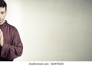 Young Friar Praying